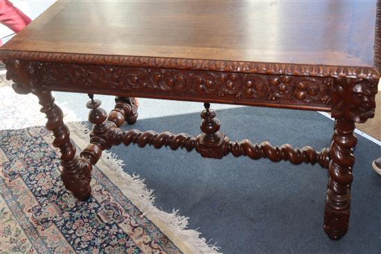 A late 19th century Flemish carved oak side table W.120cm